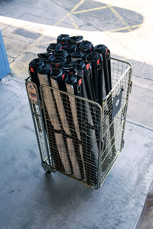 A top view of Cargowrap reusable pallet wraps in a storage crate