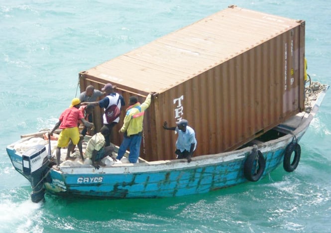 Shipping container in small boat