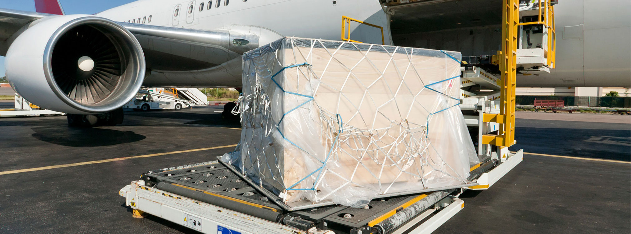 Extra wide polythene sheeting for protection of air cargo